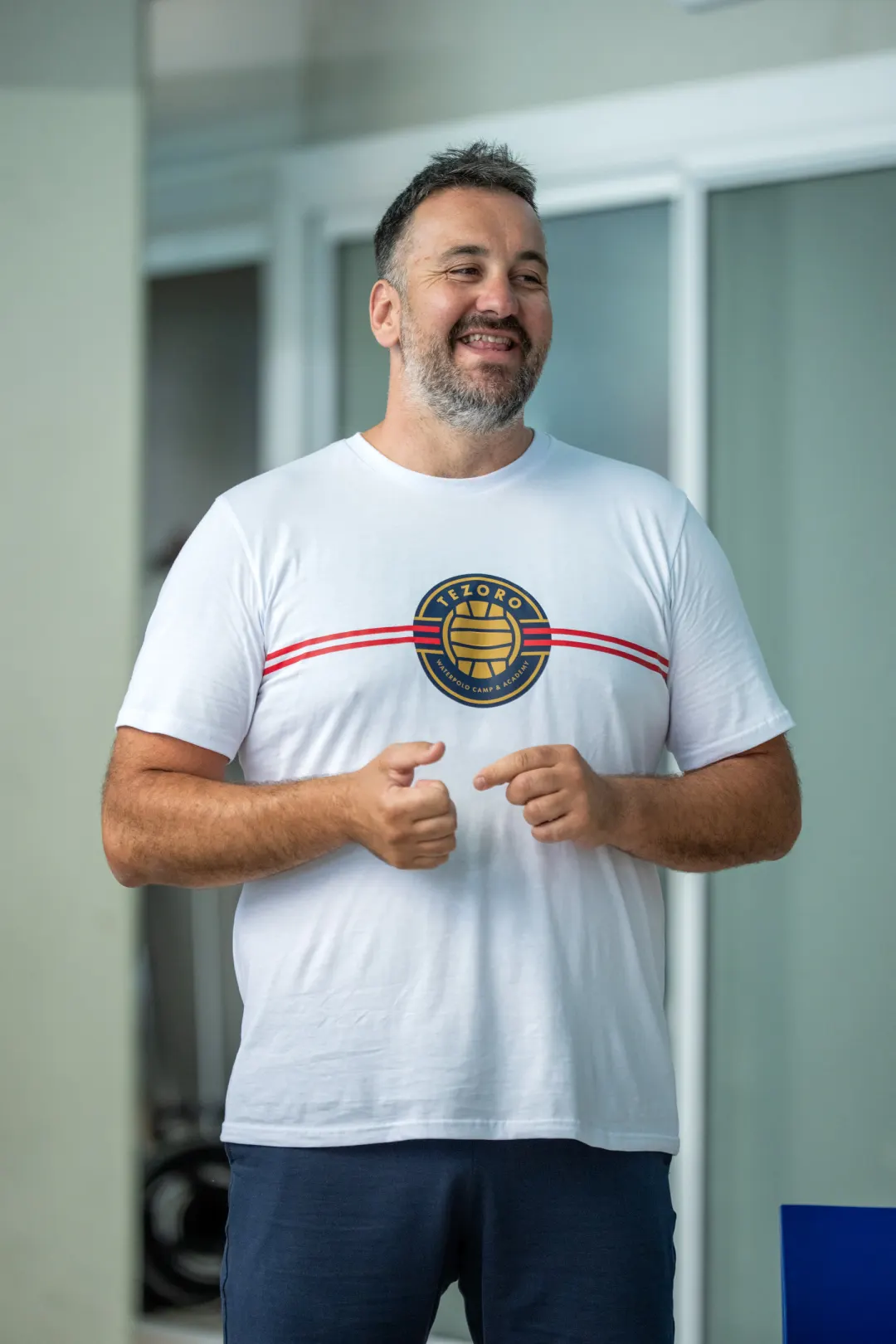 Smiling coach on deck