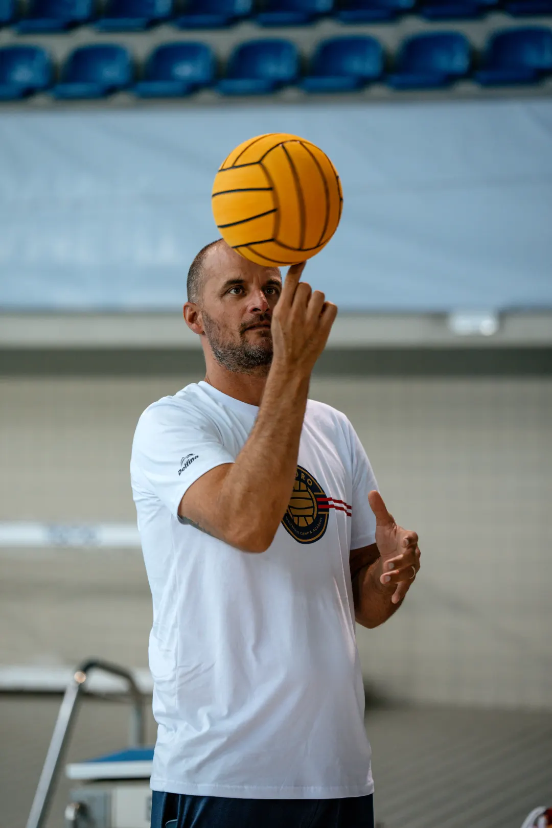Coach spinning a ball on his finger